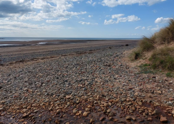 Warning after rock found on Cumbrian beach sets man’s clothes on fire