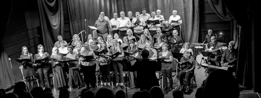 Choir surprises Workington shoppers with impromptu town centre performance