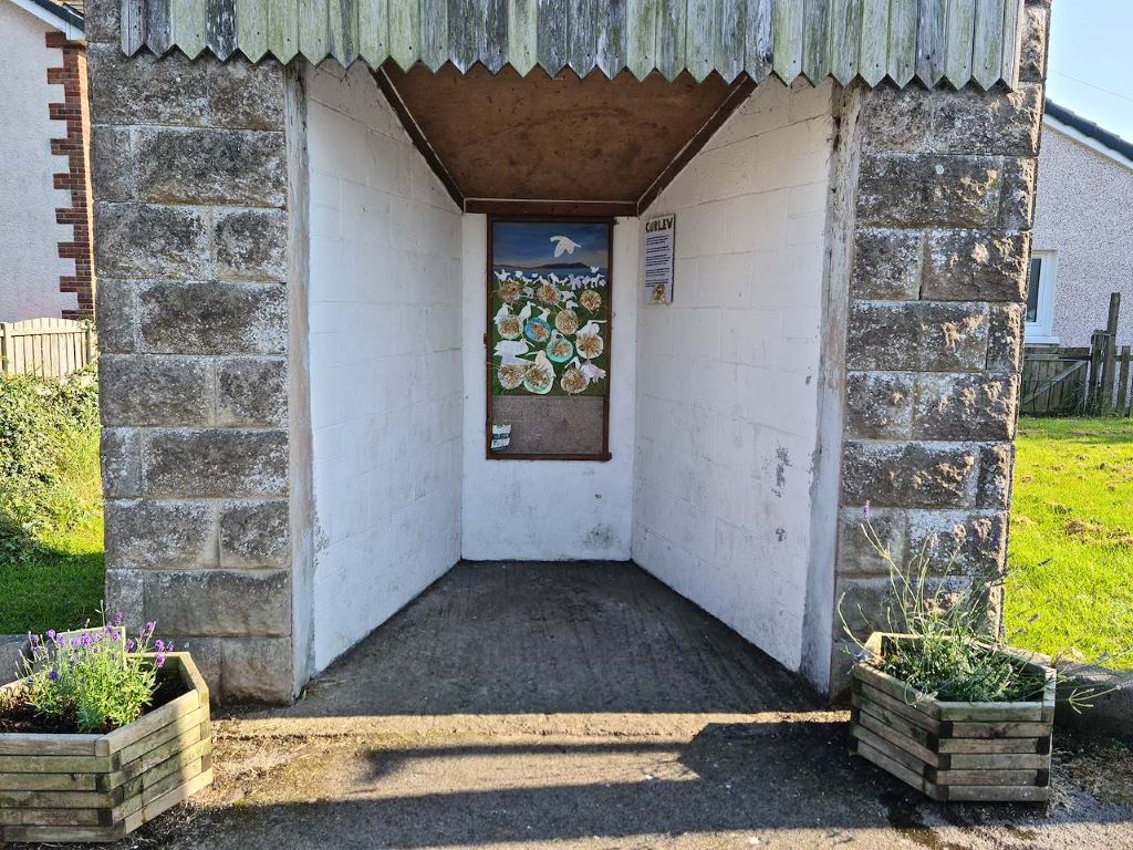 Children’s curlew artwork decorates Cumbrian village bus shelter
